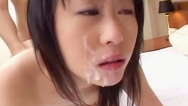 Horny Asian chick enjoys playing with two cocks at once
