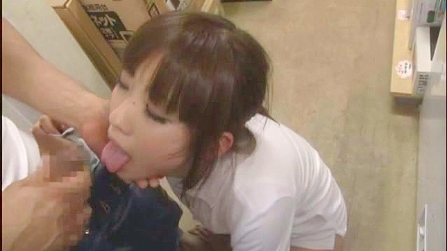 On her knees watching as someone  feeds her cock