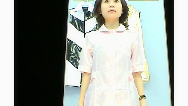 Pierced and lovely japanese girl is posing in the dressing room