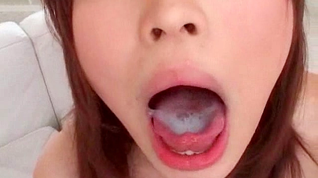 Flexible bimbo with good mood is eating fresh jizz