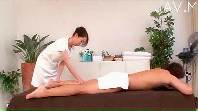 Skillful japanese masseur is doing handjob to her client