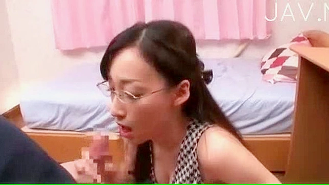 Handsome and hot japanese doll with glasses goes facial indoors