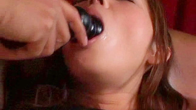 Nice looking and pretty japanese  is swallowing penis