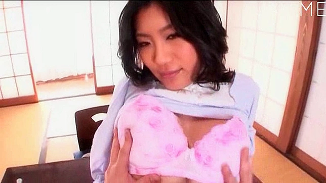 Horny Japanese chick bares her perky hooters outdoors