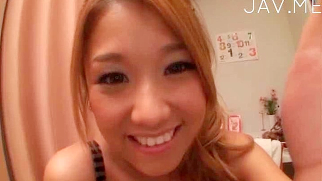Hot Japanese shows off smacking a big toy up her cherry