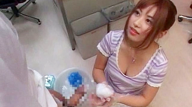 Busty and sexy japanese masseur is sucking big dick