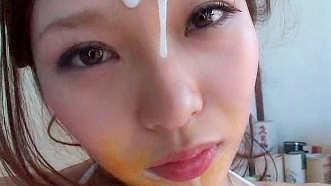 Lovely japanese teen is sucking big phallus on her knees