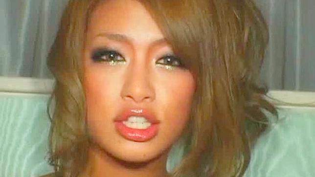 Sultry Japanese darling charms stud with explicit foot job