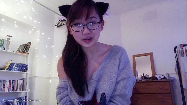 Pretty Asian chick strips on cam