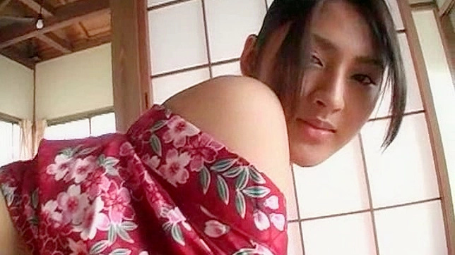 Adorable and cute asian pornstar in kimono is posing indoors