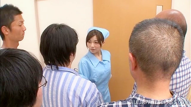Horny nurse looks eager to deal all these dicks between her lips
