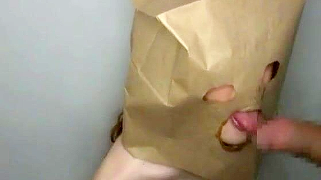 Asian Porn Video - Exploring the Art of Face Fucking with a Paper Bag
