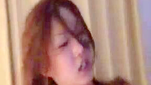 Caught on Camera - Adult Asian Couple's Intimate Moment