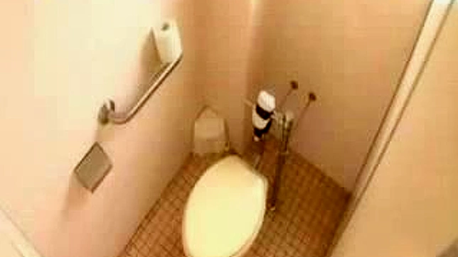 Masturbating Oriental schoolgirl in toilet