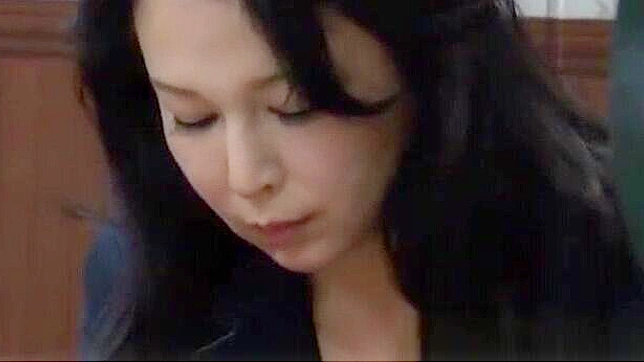 Mature Japanese Office Lady Gets Hand Job From Co-Worker in Public